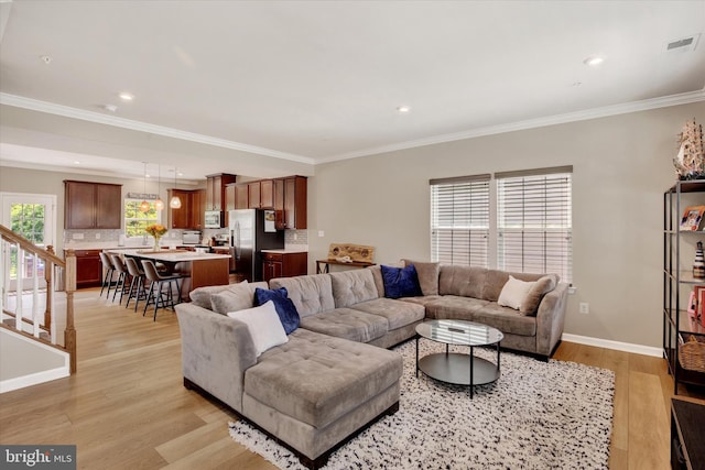 182 Mohegan Dr, Havre De Grace, MD 21078 - living room with light wood-style flooring, ornamental molding, recessed lighting, and baseboards