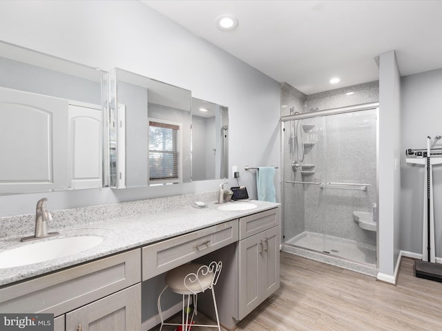 87 Tulip Poplar Dr, Linden, VA 22642 - full bathroom featuring double vanity, a shower stall, wood finished floors, and recessed lighting