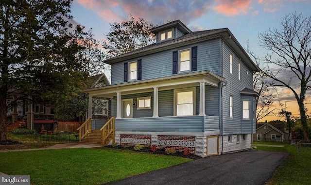 2715 Louise Ave, Baltimore, MD 21214 - american foursquare style home with covered porch and a yard