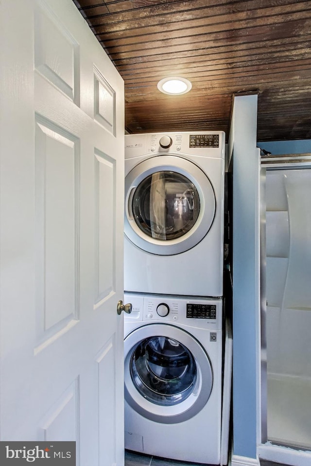5016 56th Ave, Hyattsville, MD 20781 - laundry area featuring stacked washer and clothes dryer and wooden ceiling