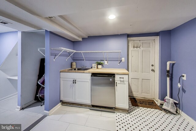 5016 56th Ave, Hyattsville, MD 20781 - kitchen with white cabinets, fridge, wood counters, recessed lighting, and light tile patterned flooring