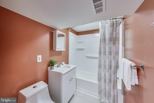 5016 56th Ave, Hyattsville, MD 20781 - full bathroom featuring vanity, shower / bath combo, and tile patterned flooring