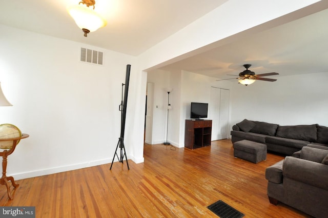 81 Jarvis St, Pemberton, NJ 08068 - living area with wood finished floors, a ceiling fan, and baseboards