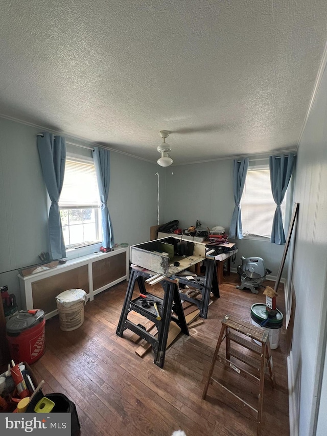 8600 Willow Oak Rd, Baltimore, MD 21234 - dining area with hardwood / wood-style flooring and a textured ceiling