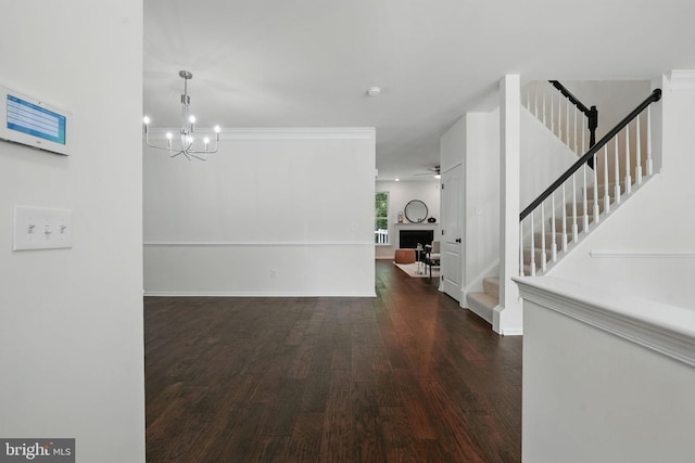 5605 Swift Creek Ct, Haymarket, VA 20169 - corridor featuring wood finished floors, a chandelier, and stairs