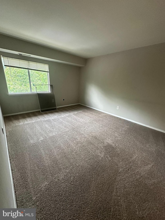 7980 Audubon Ave Unit C3, Alexandria, VA 22306 - carpeted empty room featuring baseboards