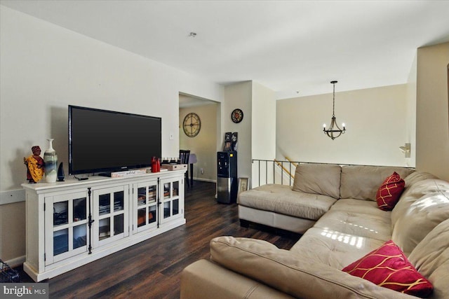 6548 10th St, Chesapeake Beach, MD 20732 - living room featuring a chandelier, wood finished floors, and baseboards