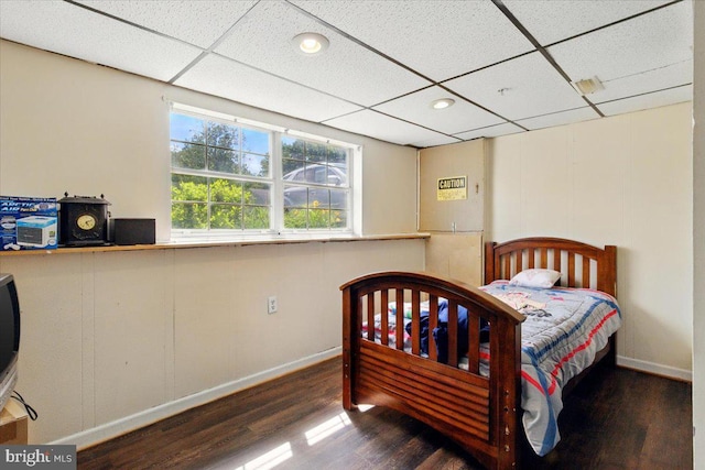6548 10th St, Chesapeake Beach, MD 20732 - bedroom with wood finished floors, a drop ceiling, baseboards, and recessed lighting