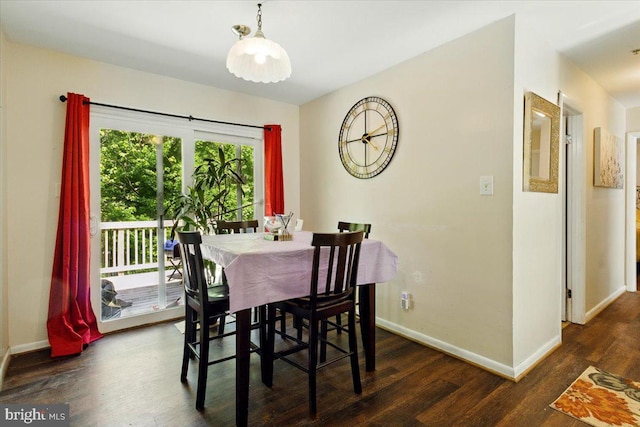 6548 10th St, Chesapeake Beach, MD 20732 - dining room featuring wood finished floors and baseboards