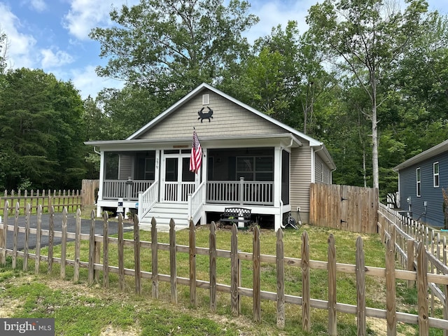 279 9th St, Colonial Beach, VA 22443 - view of front of property with a sunroom