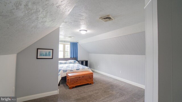 3809 Carriage House Dr, Camp Hill, PA 17011 - bedroom with a textured ceiling, vaulted ceiling, and carpet floors