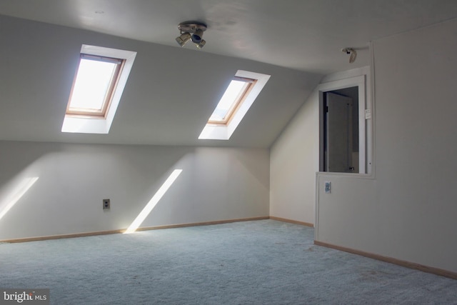 34 Andrew St, Hamilton, NJ 08610 - bonus room featuring a skylight, lofted ceiling, and carpet flooring