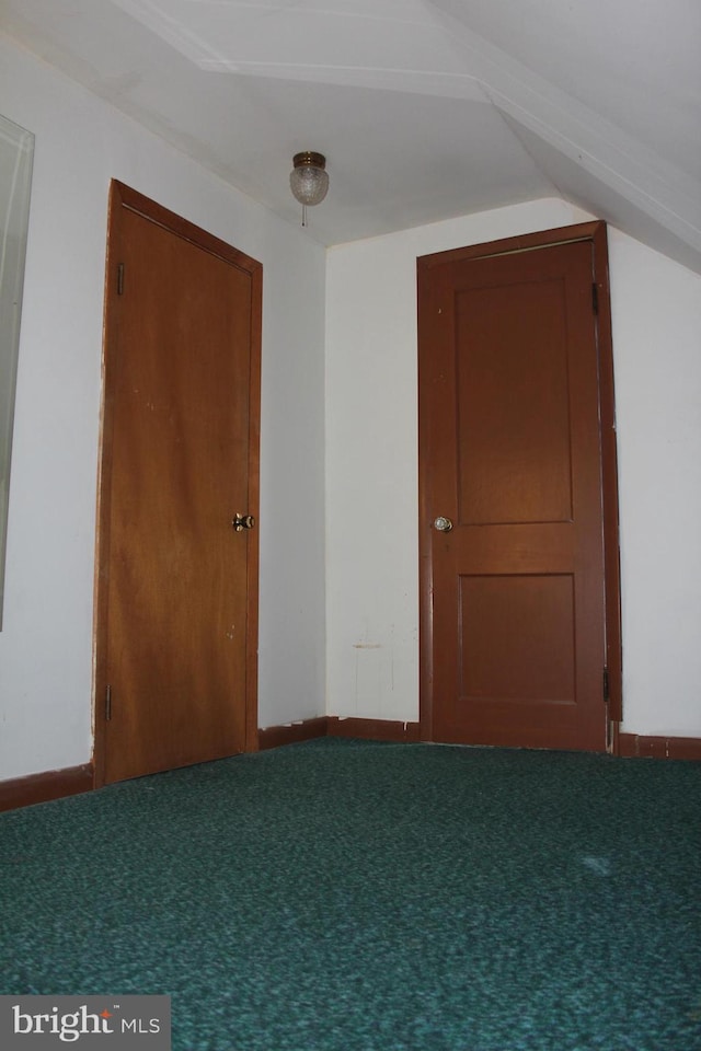 34 Andrew St, Hamilton, NJ 08610 - carpeted spare room with vaulted ceiling