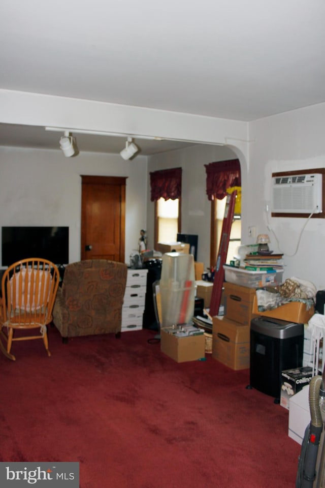 34 Andrew St, Hamilton, NJ 08610 - living area with carpet flooring, a wall mounted air conditioner, and arched walkways