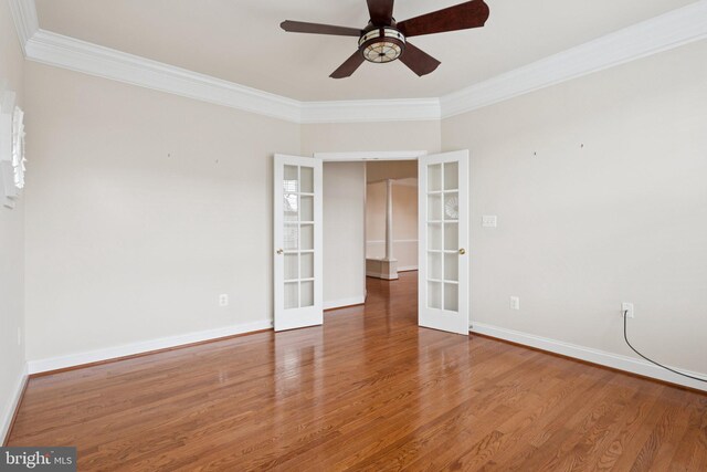 24 Tocati St, Thurmont, MD 21788 - spare room with french doors, ornamental molding, wood finished floors, and a ceiling fan