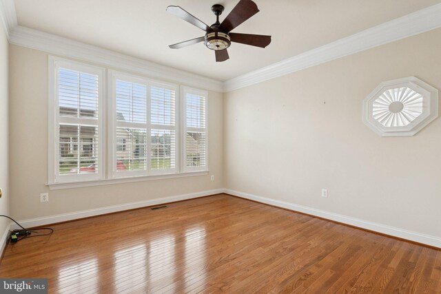 24 Tocati St, Thurmont, MD 21788 - empty room with wood finished floors, ornamental molding, and a ceiling fan