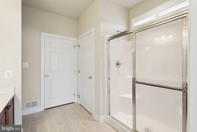 24 Tocati St, Thurmont, MD 21788 - full bathroom featuring a shower stall, vanity, and tile patterned floors