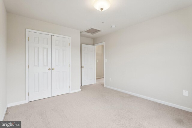 24 Tocati St, Thurmont, MD 21788 - unfurnished bedroom with carpet flooring, a closet, and attic access