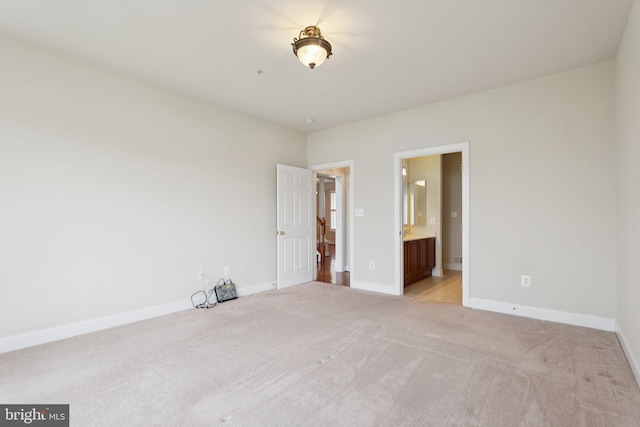 24 Tocati St, Thurmont, MD 21788 - unfurnished bedroom featuring light colored carpet and ensuite bath