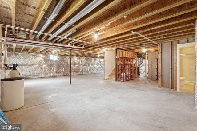 24 Tocati St, Thurmont, MD 21788 - unfinished basement featuring a water softener system and stairs