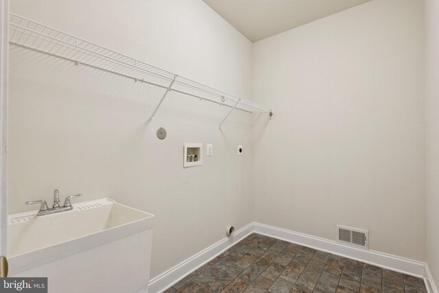 24 Tocati St, Thurmont, MD 21788 - washroom with electric dryer hookup, washer hookup, and stone finish floors