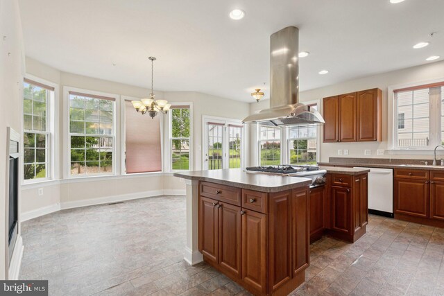 24 Tocati St, Thurmont, MD 21788 - kitchen with white dishwasher, island range hood, stainless steel gas cooktop, a kitchen island, and stone finish floors