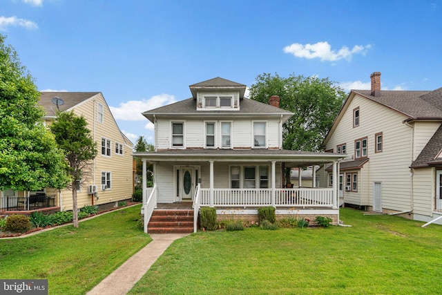 108 1st Ave, Glen Burnie, MD 21061 - view of front of house with a porch, a front lawn, and a shingled roof