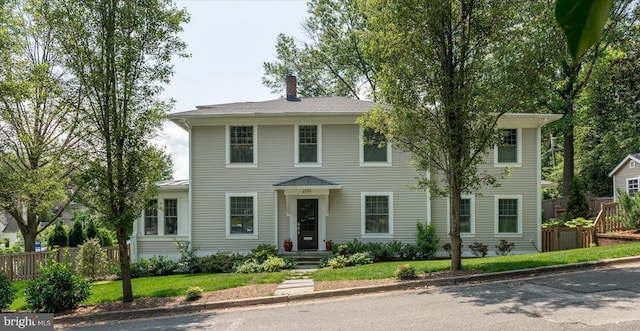200 W Monroe Ave, Alexandria, VA 22301 - colonial inspired home with a chimney and a standing seam roof