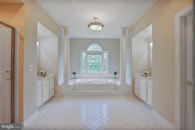 5438 Sherman Oaks Ct, Haymarket, VA 20169 - bathroom with decorative columns, vanity, a bath, and tile patterned flooring