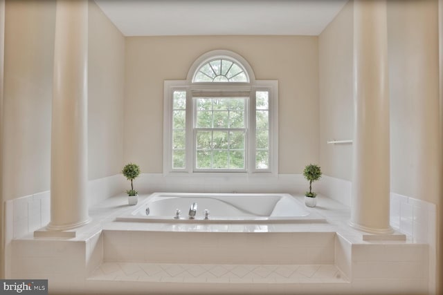 5438 Sherman Oaks Ct, Haymarket, VA 20169 - bathroom with a garden tub and decorative columns