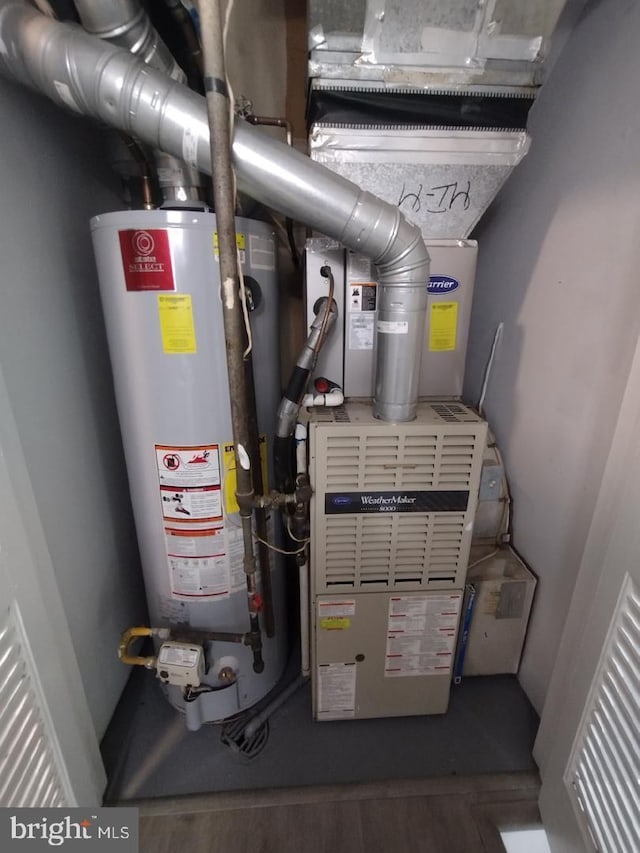 2573 Paxton St, Woodbridge, VA 22192 - utility room with gas water heater and heating unit