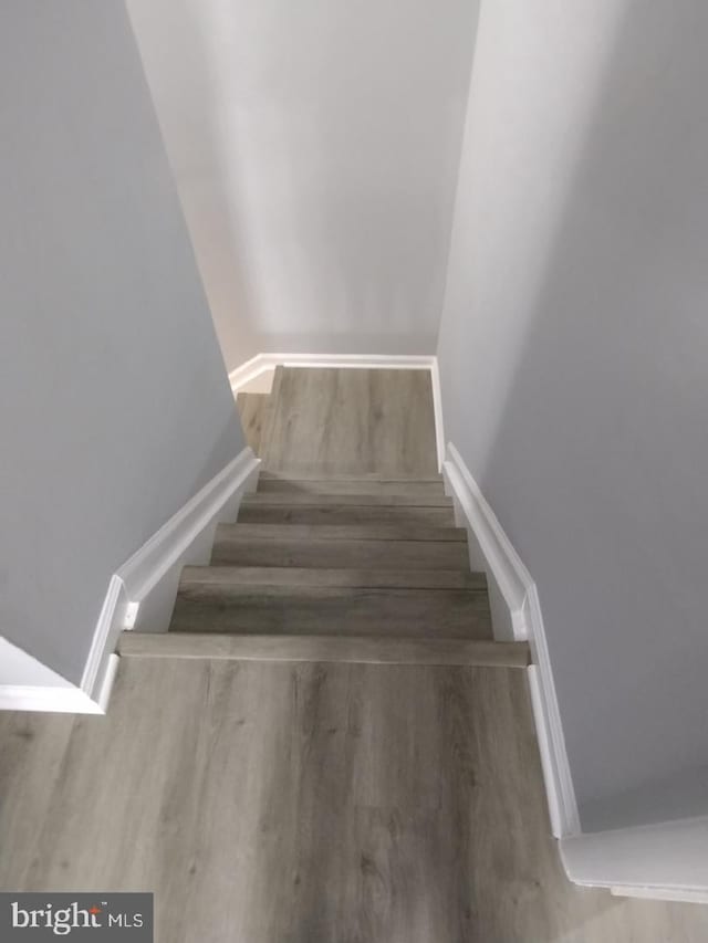 2573 Paxton St, Woodbridge, VA 22192 - stairs with wood finished floors and baseboards