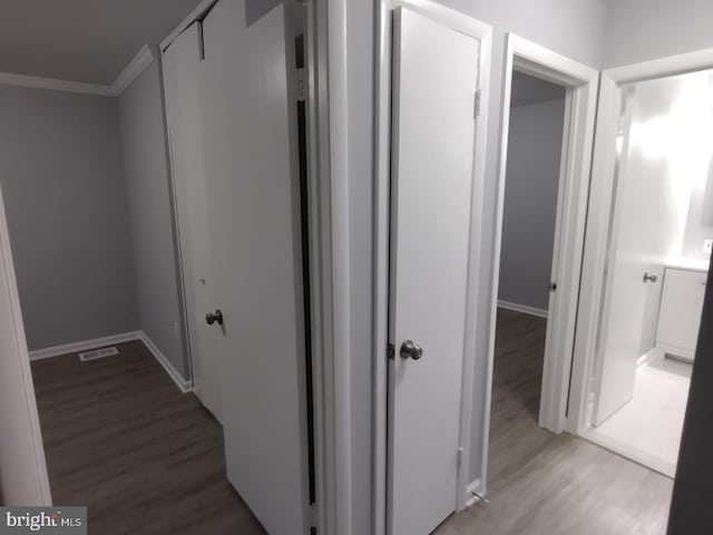 2573 Paxton St, Woodbridge, VA 22192 - hall with ornamental molding, wood finished floors, and baseboards