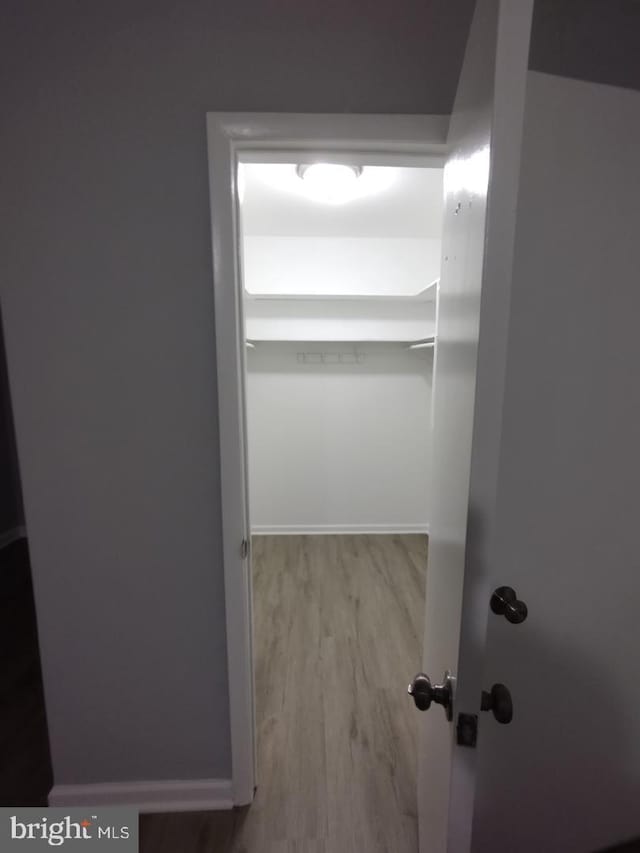 2573 Paxton St, Woodbridge, VA 22192 - walk in closet with wood finished floors