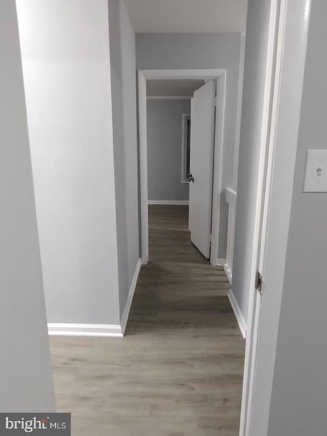 2573 Paxton St, Woodbridge, VA 22192 - corridor featuring light wood-style floors and baseboards