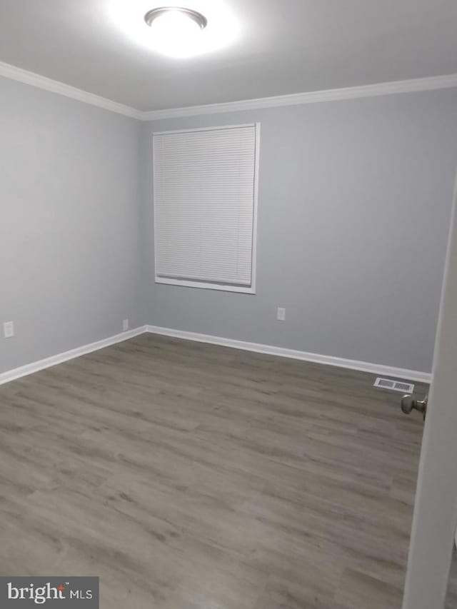 2573 Paxton St, Woodbridge, VA 22192 - unfurnished room featuring crown molding, wood finished floors, and baseboards