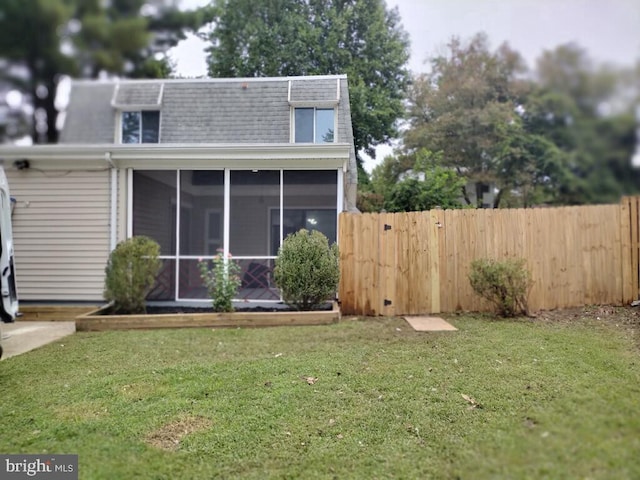 2573 Paxton St, Woodbridge, VA 22192 - rear view of property featuring a shingled roof, a sunroom, and mansard roof