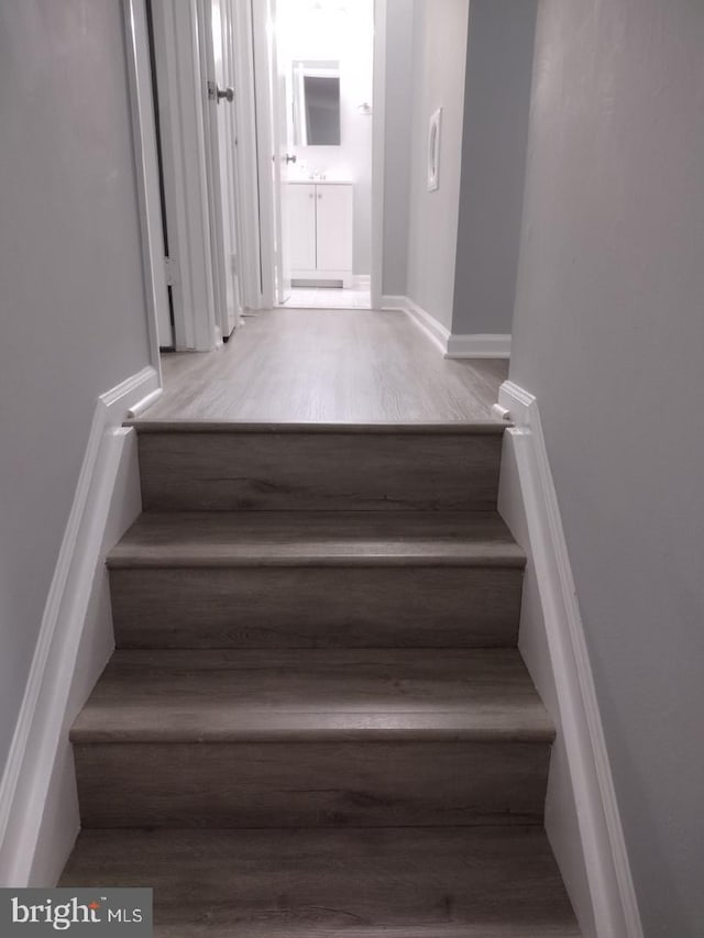 2573 Paxton St, Woodbridge, VA 22192 - staircase with wood finished floors and baseboards