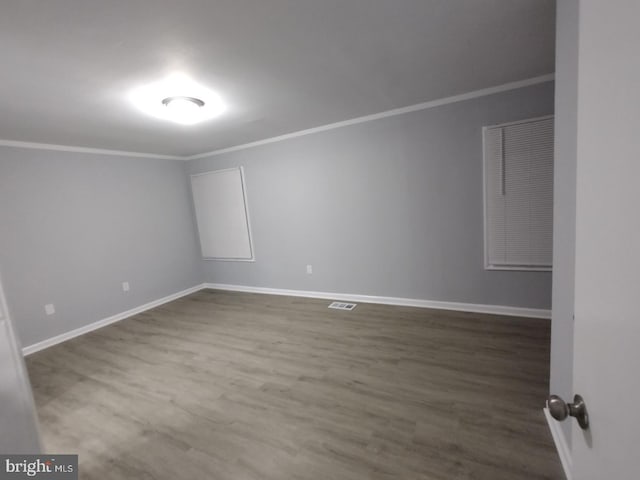 2573 Paxton St, Woodbridge, VA 22192 - spare room featuring ornamental molding, wood finished floors, and baseboards