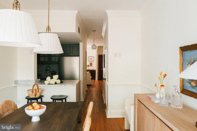 708 9th St SE, Washington, DC 20003 - dining space with dark wood finished floors and crown molding