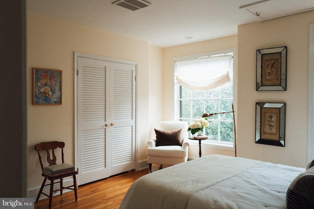 708 9th St SE, Washington, DC 20003 - bedroom with wood finished floors and a closet