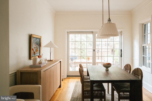 708 9th St SE, Washington, DC 20003 - dining area with light wood-style flooring and ornamental molding
