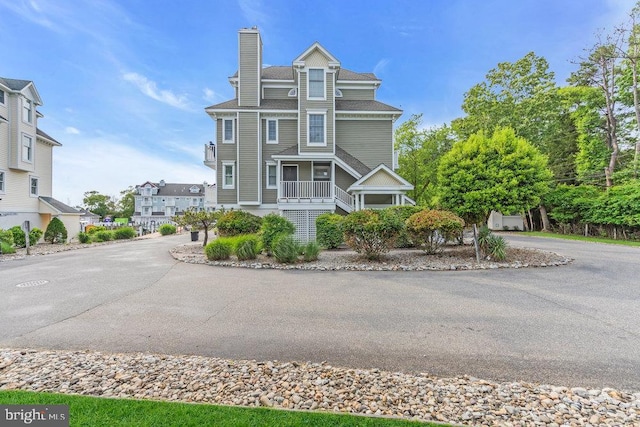 342 Harbor Vw Unit 42, Forked River, NJ 08731 - view of front facade featuring a chimney and driveway