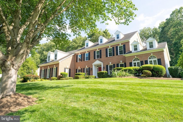 9711 Brookstone Ln, Vienna, VA 22182 - view of front of property with brick siding and a front yard