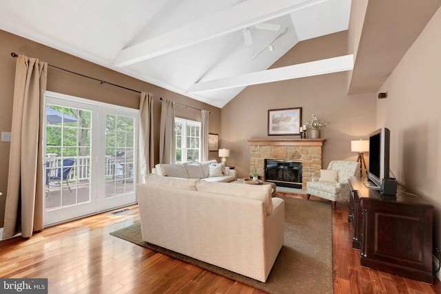 1337 Pennsridge Pl, Downingtown, PA 19335 - living room featuring vaulted ceiling, a fireplace, and wood finished floors