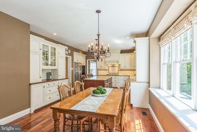 1337 Pennsridge Pl, Downingtown, PA 19335 - dining area with a chandelier, recessed lighting, wood finished floors, healthy amount of natural light, and baseboards