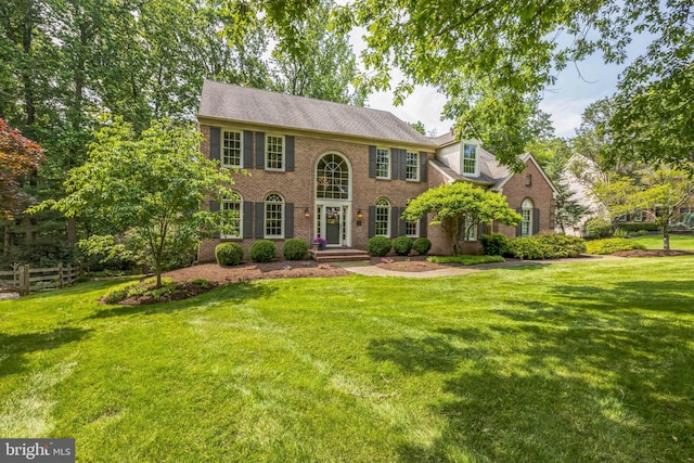 1337 Pennsridge Pl, Downingtown, PA 19335 - georgian-style home with brick siding and a front yard