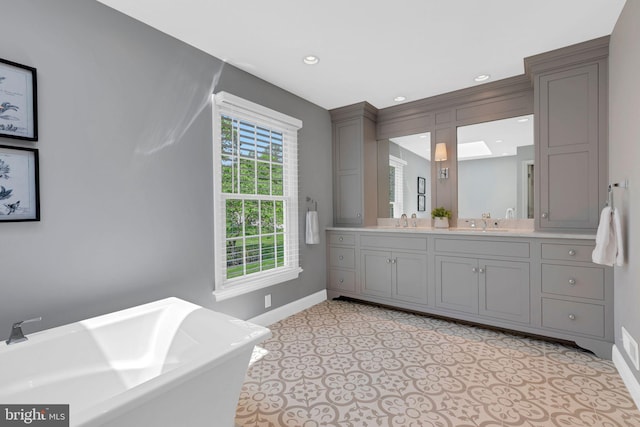 1337 Pennsridge Pl, Downingtown, PA 19335 - full bathroom featuring baseboards, double vanity, a soaking tub, and recessed lighting
