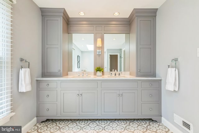 1337 Pennsridge Pl, Downingtown, PA 19335 - bathroom featuring baseboards, double vanity, tile patterned floors, and recessed lighting