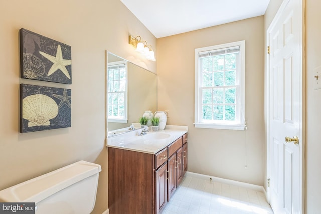 1337 Pennsridge Pl, Downingtown, PA 19335 - bathroom with vanity, toilet, baseboards, and tile patterned floors